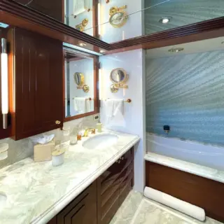 Two of the guest en suite bathrooms feature a soaking tub/shower combo.