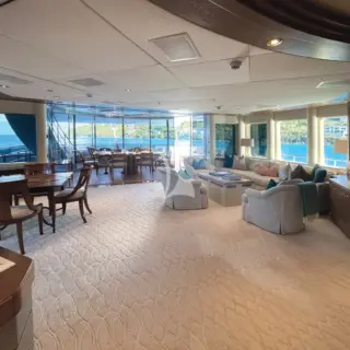 An expansive Sky Lounge on the Bridge Deck leads into a convertible al fresco dining area, equipped with retractible glass partitions for enjoying the panoramic view of the outside without unfavorable weather conditions.