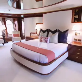 A luxurious, full-beam master stateroom comes fully equipped with a King-sized bed, his and her en suite bathroom, with soaking tub and shower, large windows, a private office and a gym.