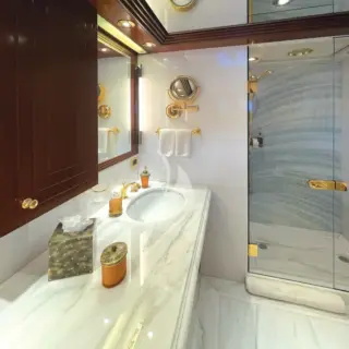 Three of the guest en suite bathrooms feature a spacious stand-up shower with glass enclosure.