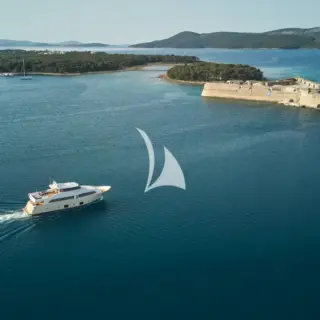 Navetta 26 Friend's Boat cruising by St Nicholas Fortress in Sibenik