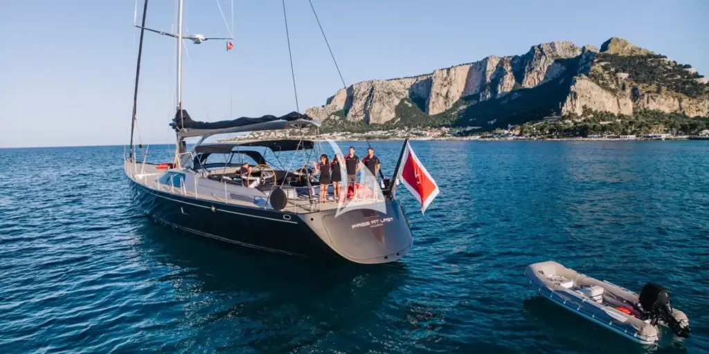 FREE AT LAST at anchor