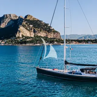 FREE AT LAST at anchor