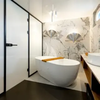 Master ensuite, with a bath tub and double sink