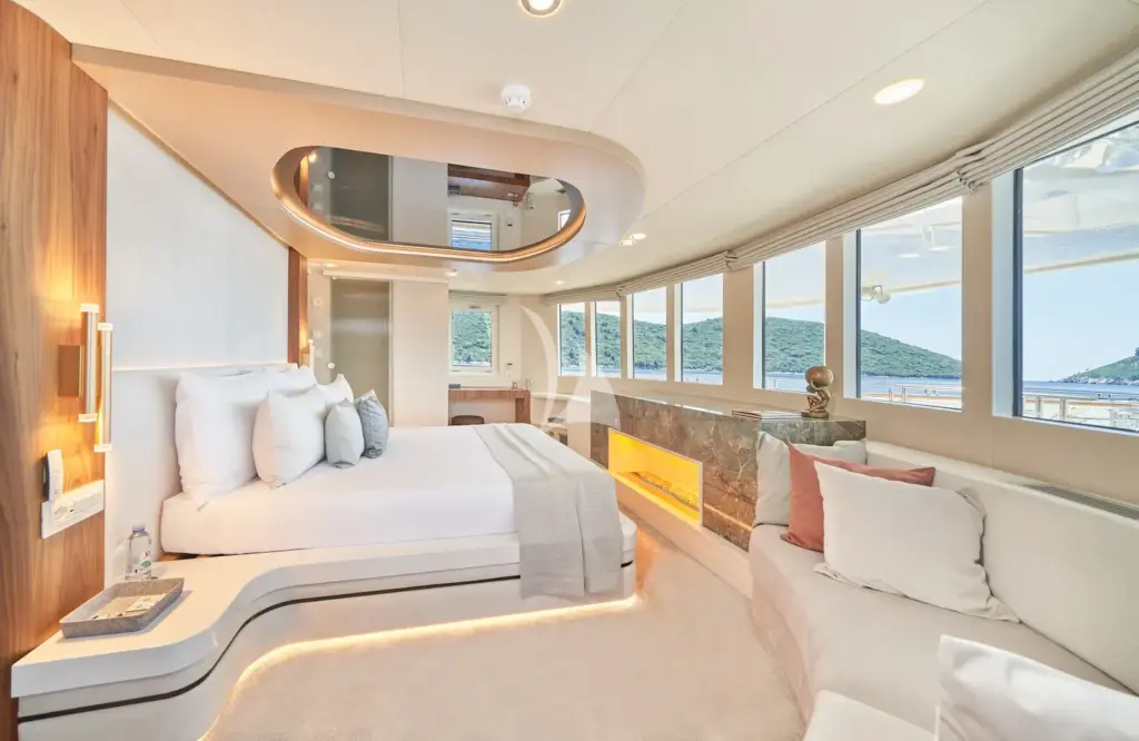 AETERNA - Master stateroom with king size bed, Smart TV and panoramic views from upper deck