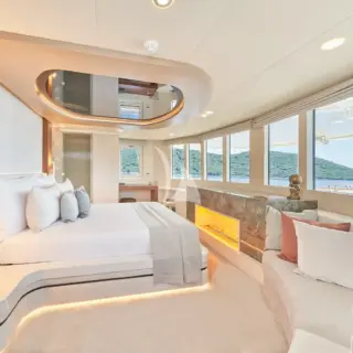 Master stateroom with king size bed, Smart TV and panoramic views from upper deck