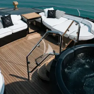 Sun deck seating and jacuzzi