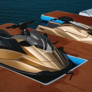 Matching gold jetskis and SeaBobs