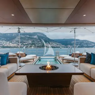 Relaxing on main deck aft, with fire pit