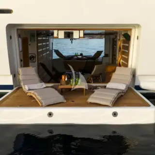 The spacious see through Beach Club with 2 large opening platforms on the sides and a door leading to the stern platfrom offers endless hours of fun and relaxation by the sea