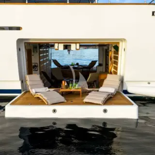 The spacious see through Beach Club with 2 large opening platforms on the sides and a door leading to the stern platfrom offers endless hours of fun and relaxation by the sea