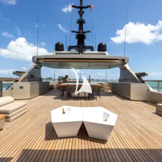 Sun deck lounge, dining, jacuzzi and sun pads