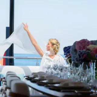 Eternal Spark - Lifestyle & Moments - Guest Catching the Wind on the Bridge Deck Aft Lounge