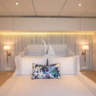 The queen size beds have a spacious walk around