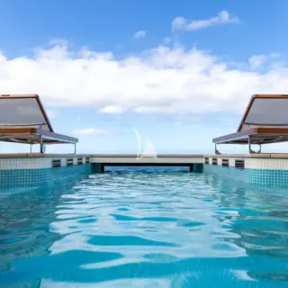 Main deck infinity pool and loungers