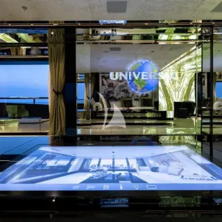 Main salon touch screen remote in the glass table