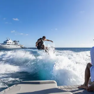 Wake Surfing from the Super Air Ski Nautique 22ft