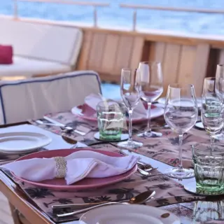 KALIZMA - dining table setup, main deck aft