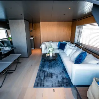 Salon with dining area and galley