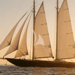 ATLANTIC sailing at sunset