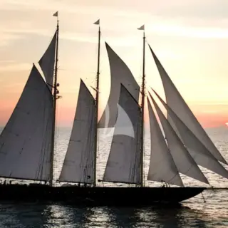 ATLANTIC sailing at sunset