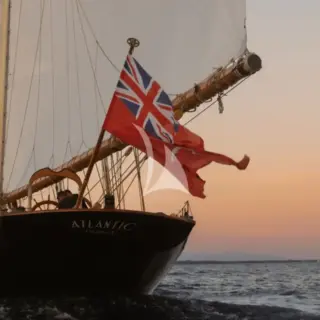 ATLANTIC sailing at sunset