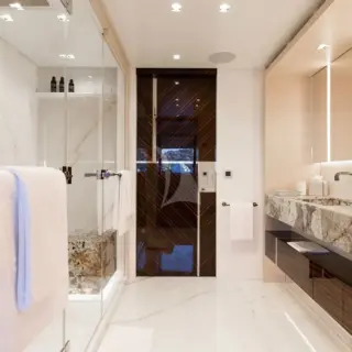 Principle's En-suite located behind the bed arrangement