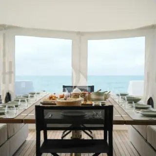 Main aft deck, enclosed dining setup