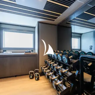 Gym has glass doors opening onto a private platform