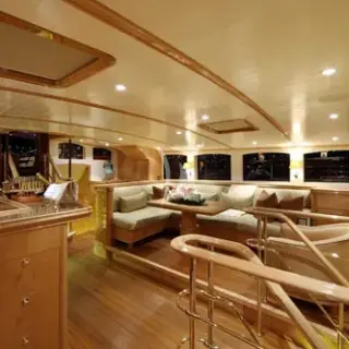 Portside of deckhouse and stairs to salon
