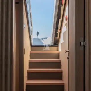 Private staircase from owner’s suite to foredeck seating area