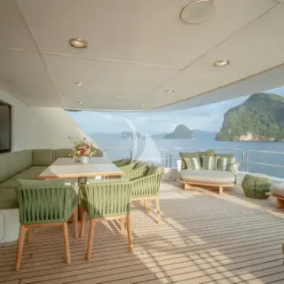 Upper aft deck dining and lounging area