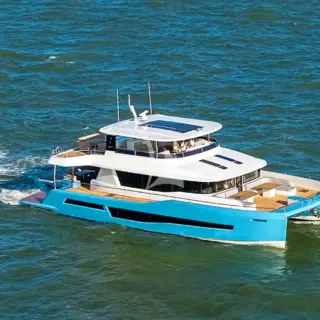 Image of a similar catamaran (Bade has a white hull)