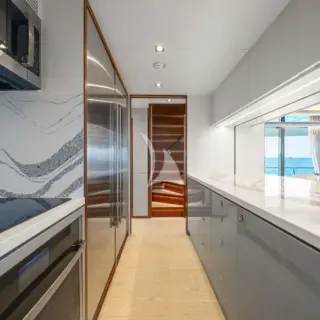 Louder - Galley view of stairs up to pilot house