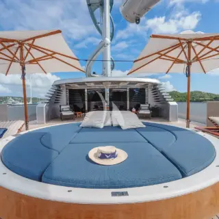 Aft sunpad with mist & sun rotating features