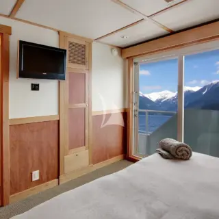 'Captains Cabin' A1-A4. Bridge Deck. King, queen or twin beds (A3 has a fixed queen bed); sliding glass door opening to a French balcony (unique among yachts)