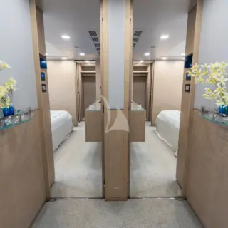 'H - Interconnecting King and Twin staterooms convert seamlessly into a private suite