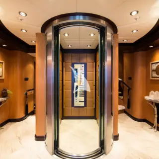 Foyer - Lift & Stairs Behind