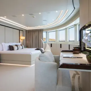 Master Suite - view of vanity unit and king size bed in the back