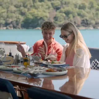 DE LISLE III - Long lunch while anchored in a calm bay.