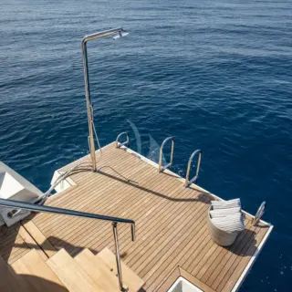 Rinse off under the swim platform shower