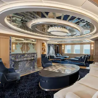 Combination of white marble, light-coloured woods, Grecian murals & white leathers