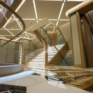 From the staircase, access the guest cabins located on the third deck