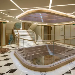 From the staircase, access the guest cabins located on the third deck