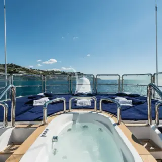 Jacuzzi and sunbathing area