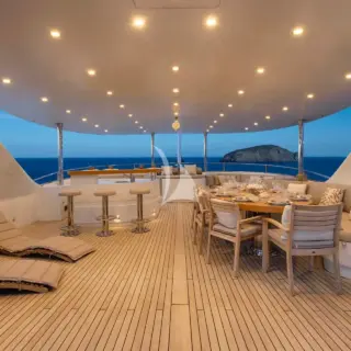 The exceptionally spacious unobstructed  sundeck has a Jacuzzi, a dining table, a bar & various spacious lounges & sunbathing areas