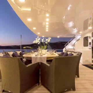 INVADER - Upper Deck Aft Dining at Sunset