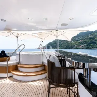 Sun deck jacuzzi, sunpads and bar