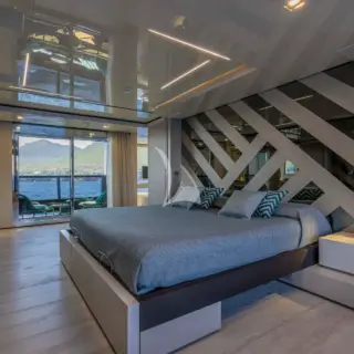 Full beam master stateroom with private balcony