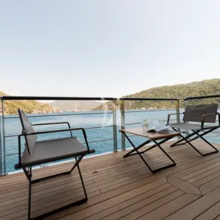 Twin balconies opening out from saloon